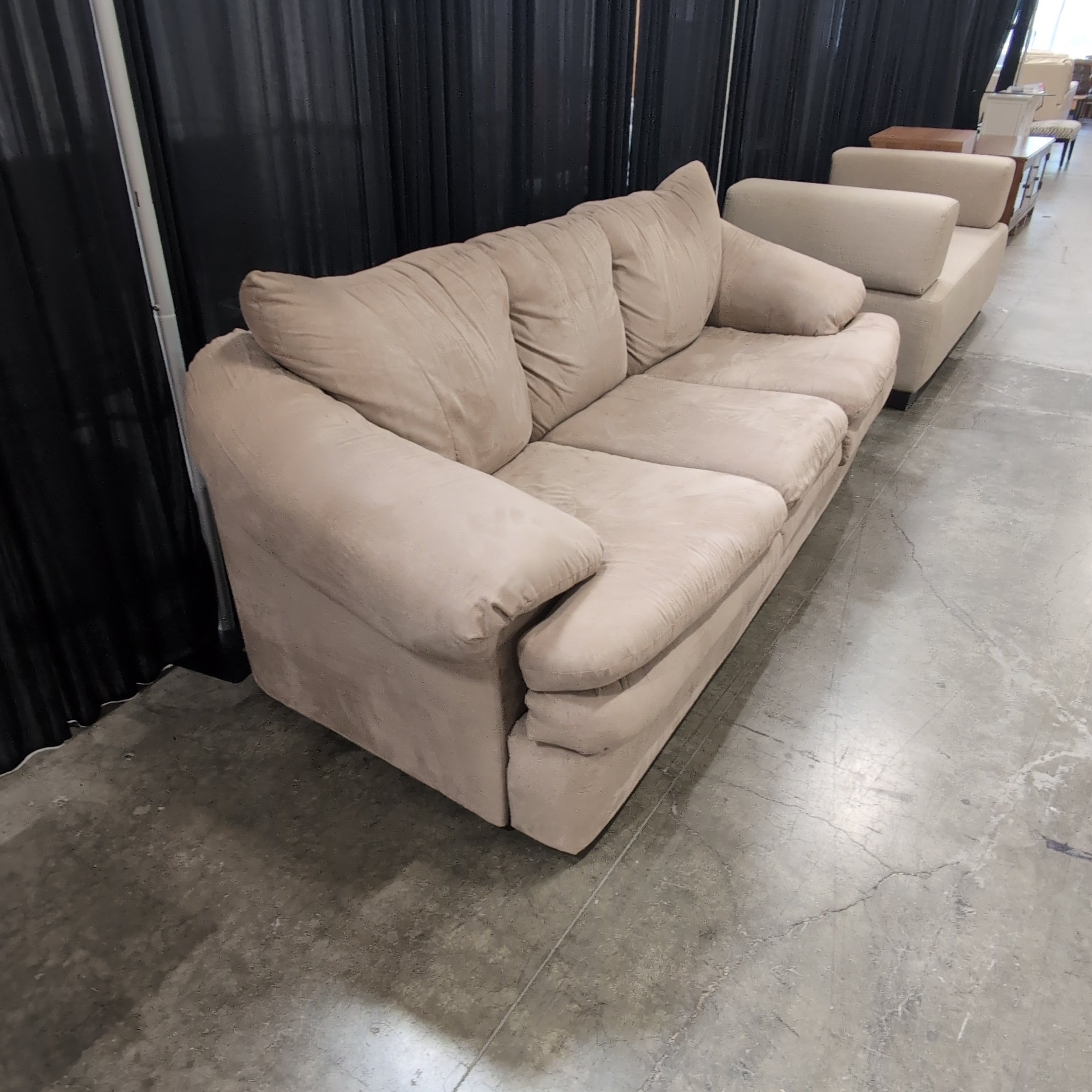 Light Brown Three-Cushion Couch in Microfiber