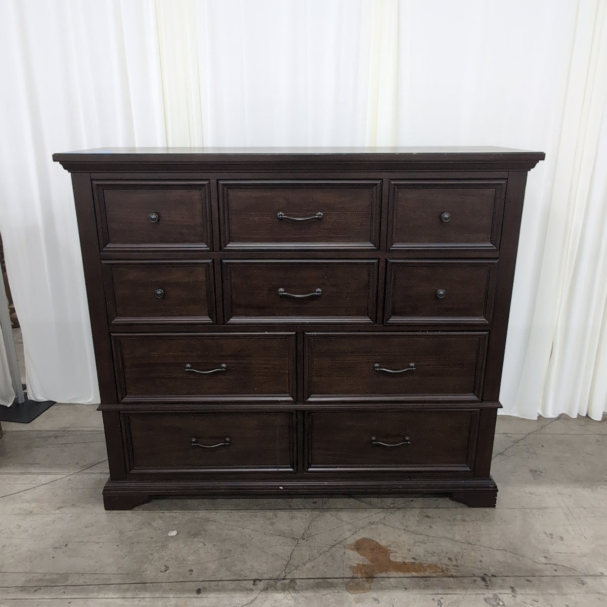 Dark Brown Wood Eight-Drawer Dresser with Ornate Hardware