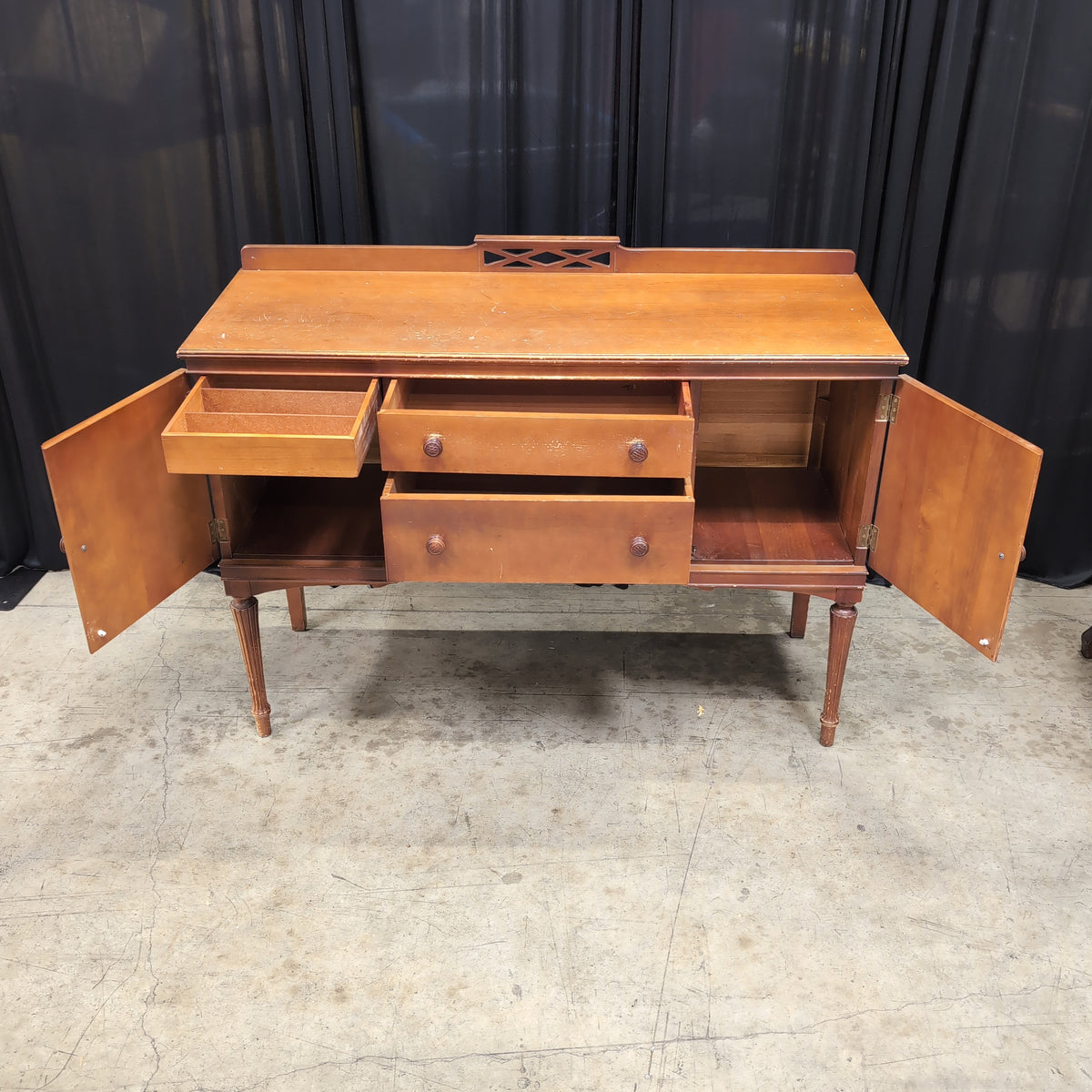 Warm Toned Wood Buffet with Fluted Legs