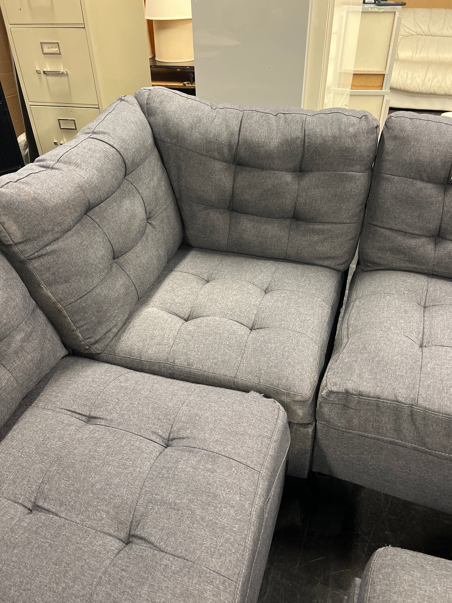 Dark Gray Upholstered Sectional with Ottoman
