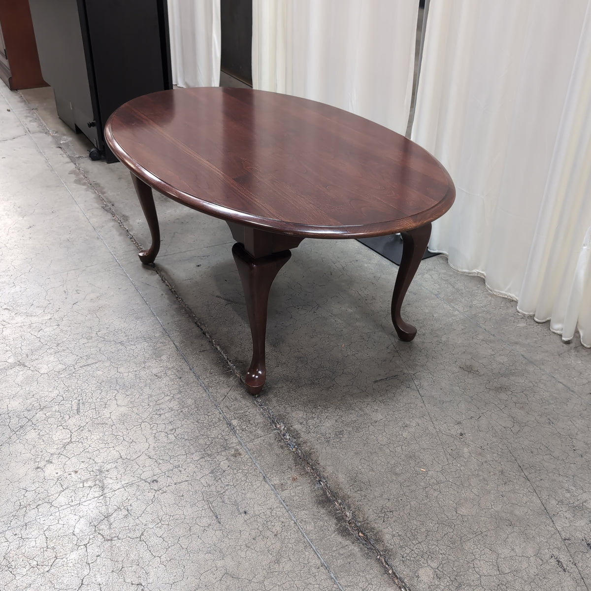 Dark Cherry Oval Wood Coffee Table with Cabriole Legs
