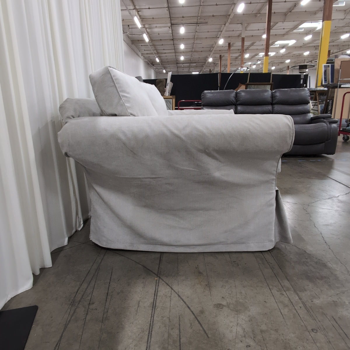 Light Grey Fabric Rolled Arm Loveseat with Skirted Base
