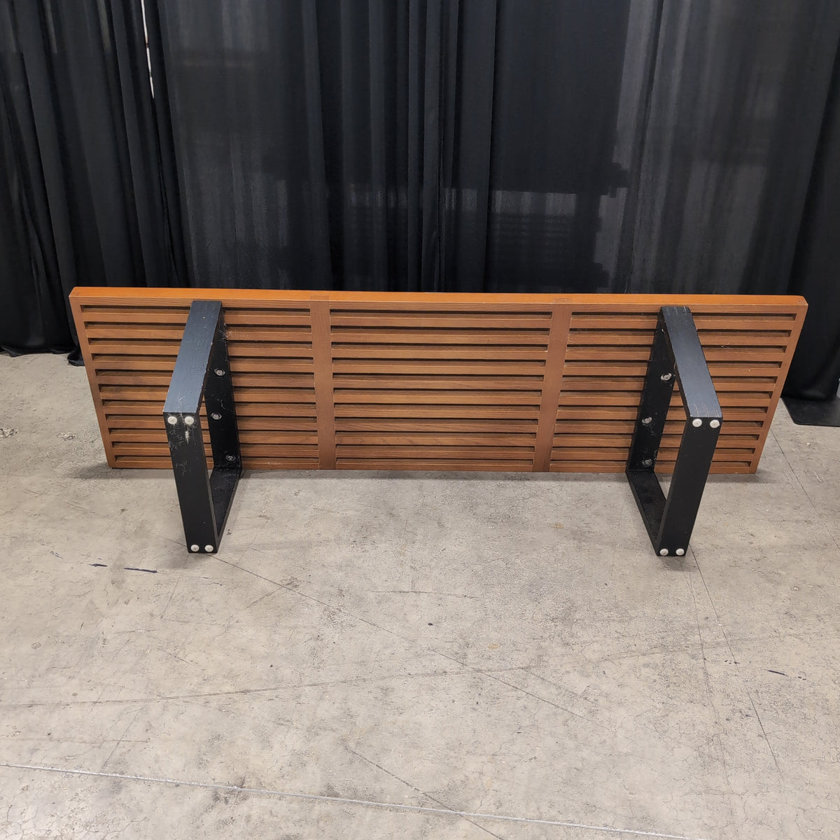 Brown Slatted Outdoor Bench in Hardwood