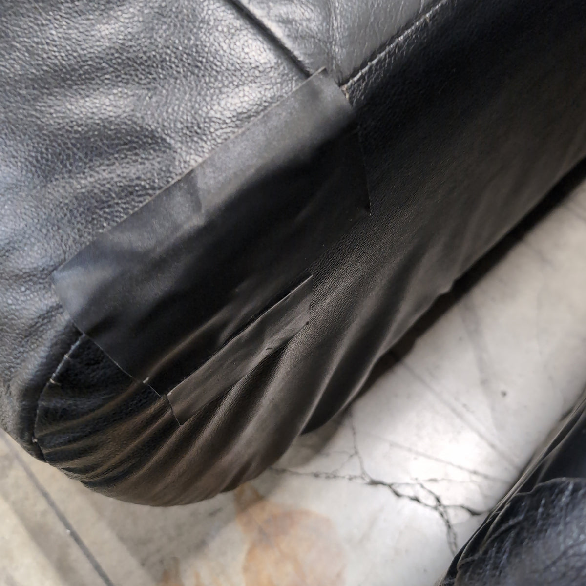 Black Tufted Leather Sectional Couch with Chrome Feet