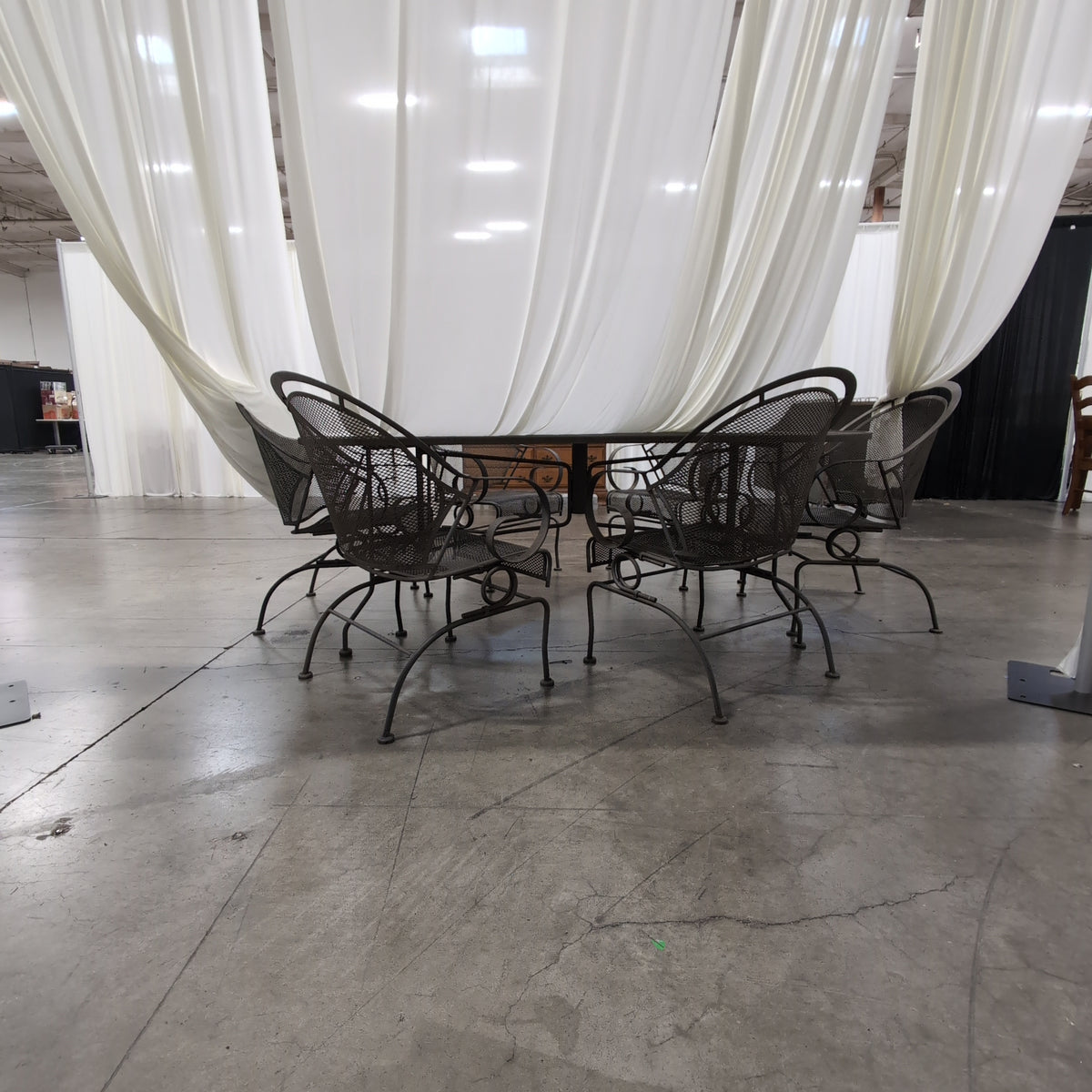 Dark Metal Oval Outdoor Table with Umbrella Hole