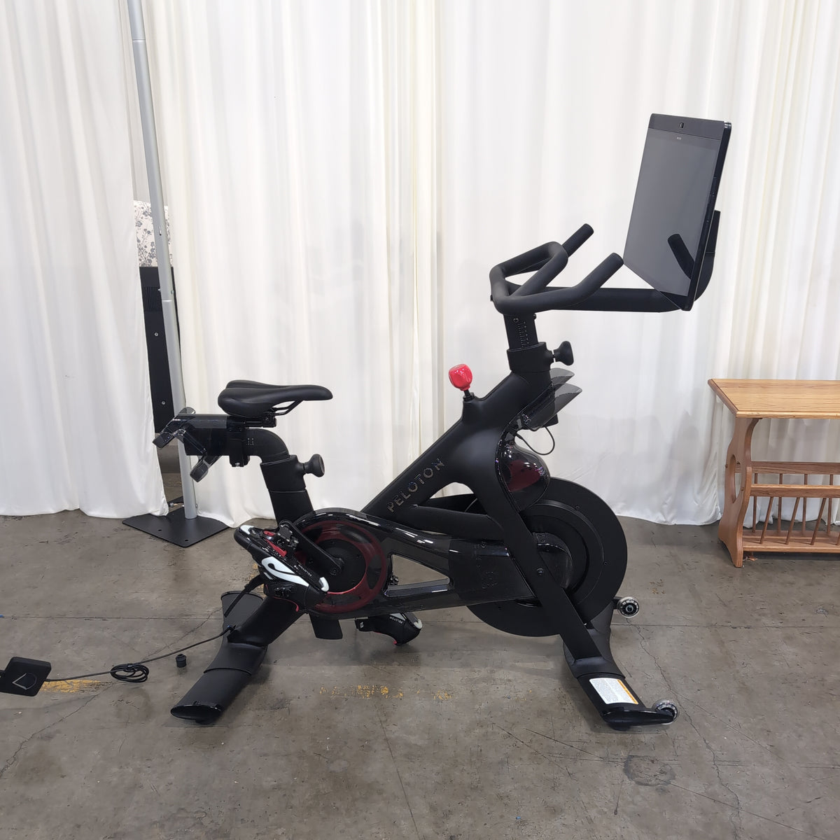 Peloton Black Exercise Bike with Interactive Screen