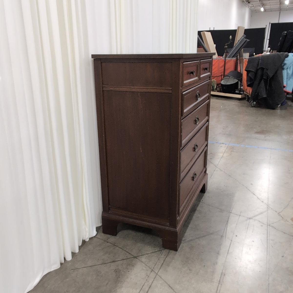Brown Wood Six-Drawer Dresser with Ornate Hardware