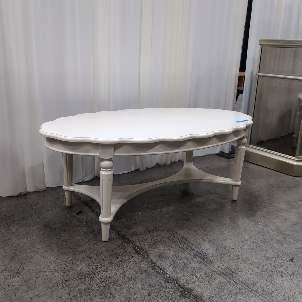 White Scalloped Oval Coffee Table