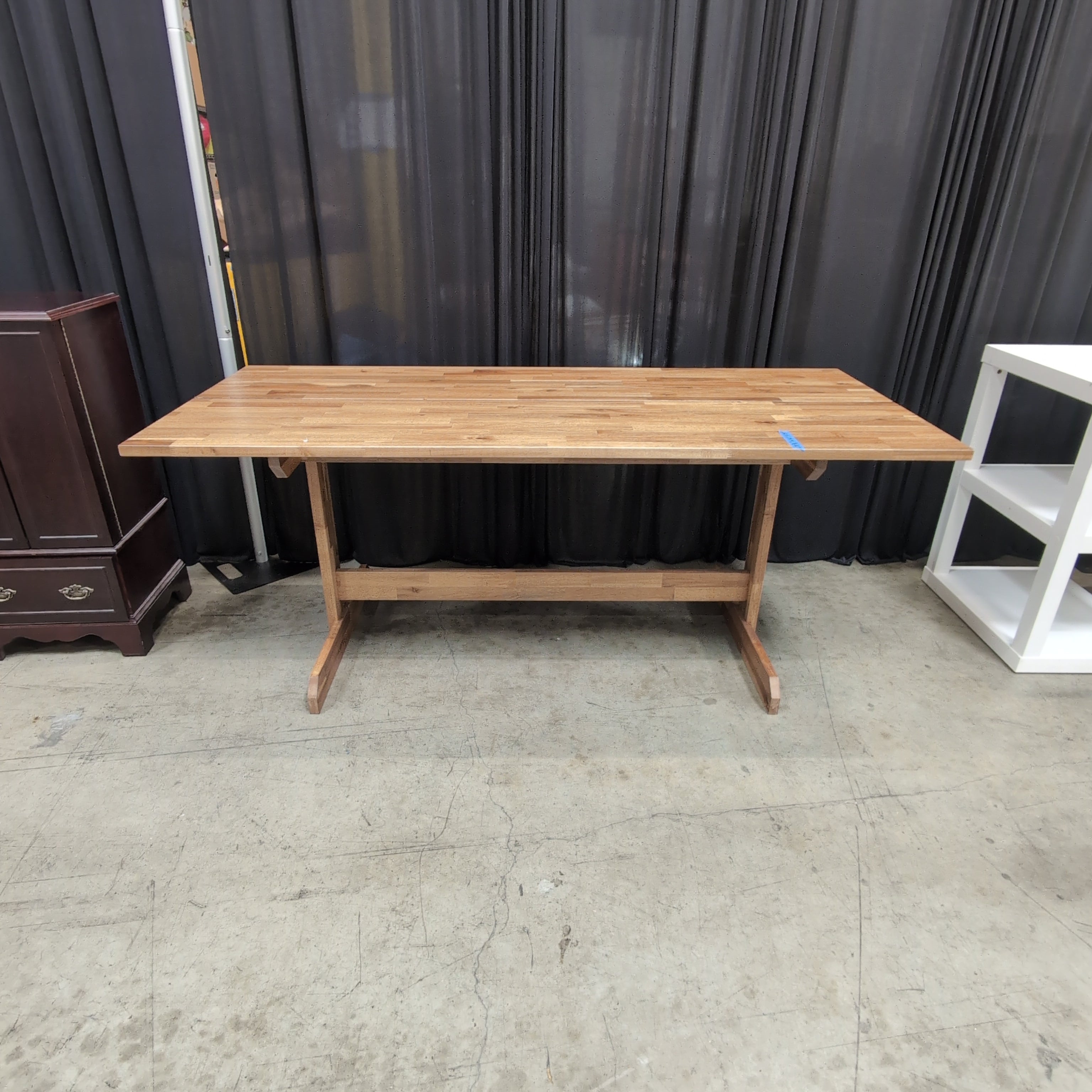 Warm Brown Wood Dining Table with Trestle Base