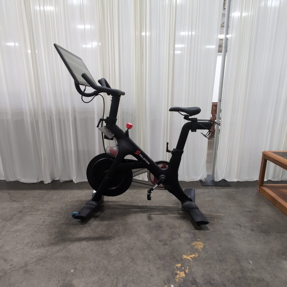 Peloton Black Exercise Bike with Interactive Screen