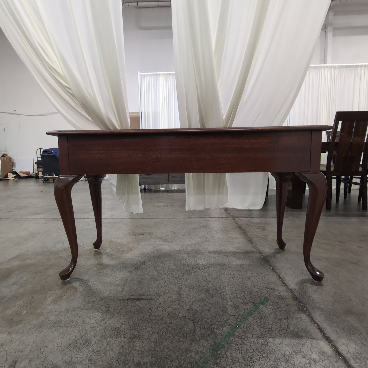 Traditional Dark Wood Console Table with Ornate Brass Hardware