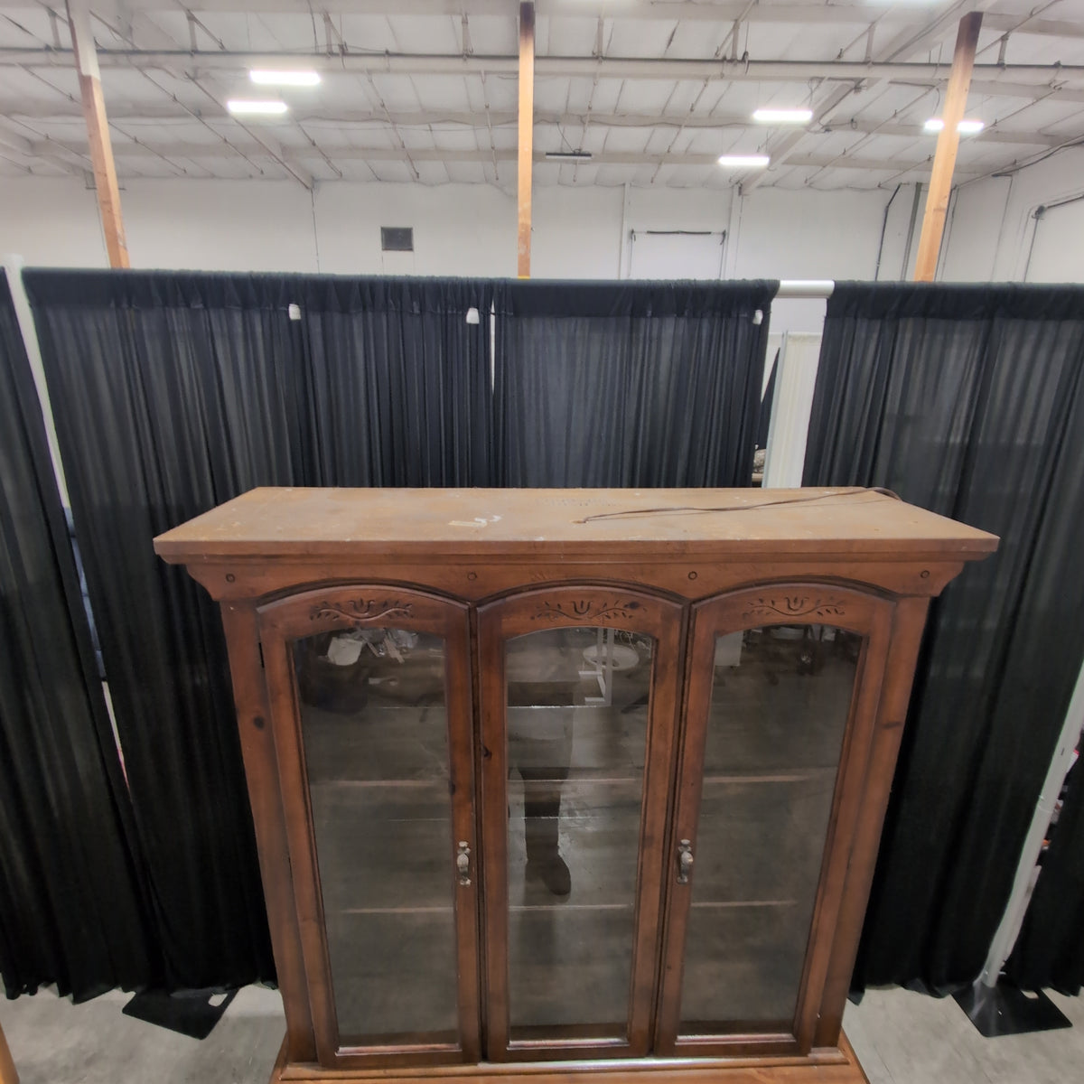 Brown Wood China Cabinet with Ornate Carvings