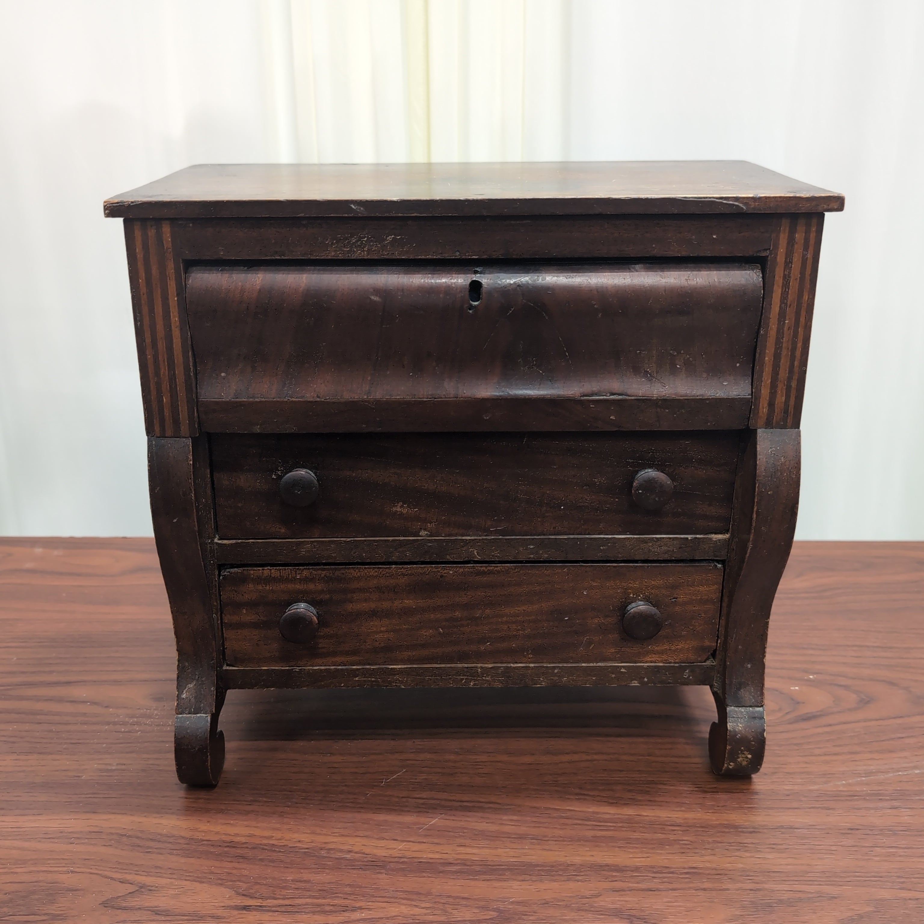 Traditional Dark Wood Three-Drawer Nightstand