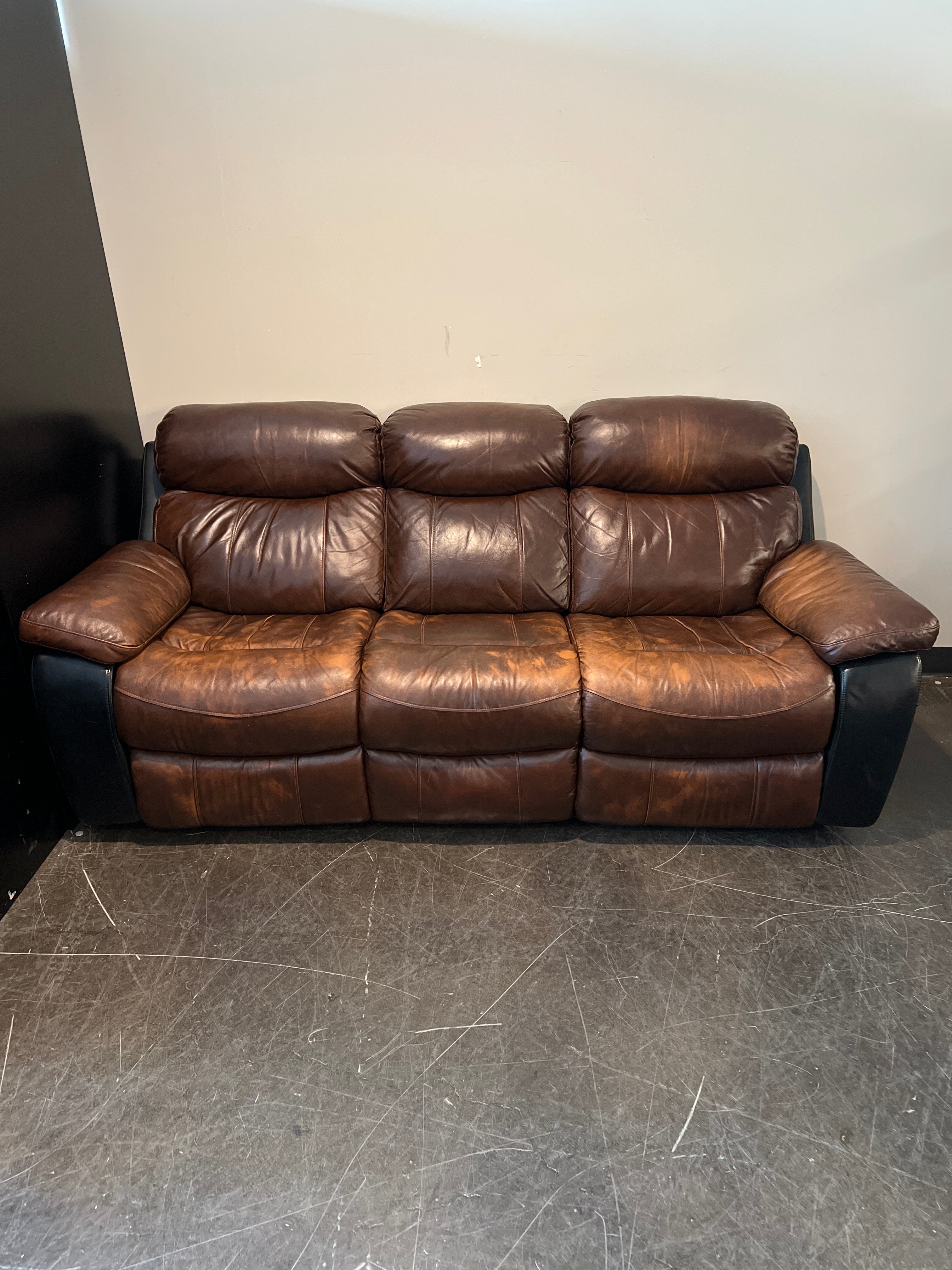 Brown Leather Reclining Sofa