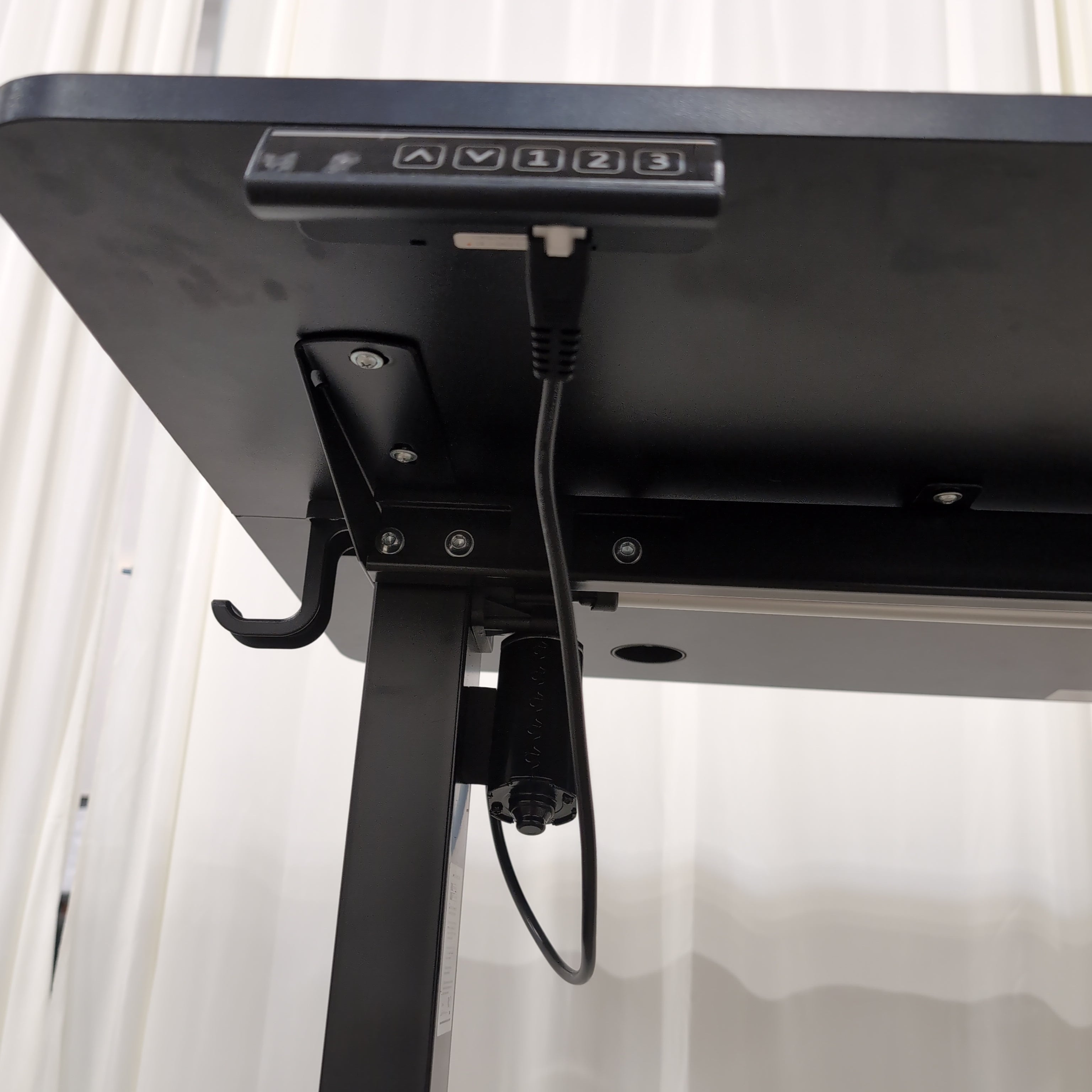Black Electric Height-Adjustable Desk with Grommet Holes