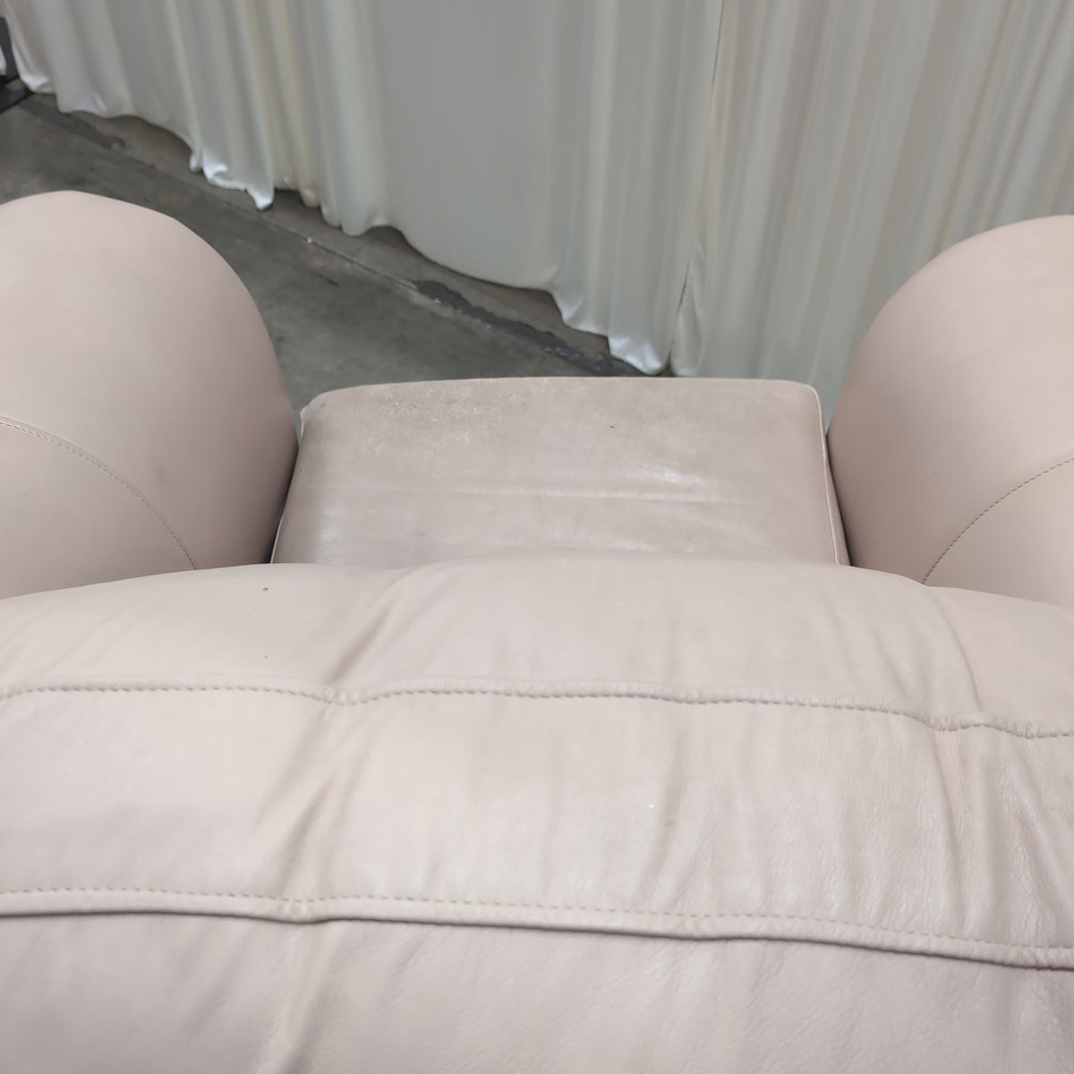 Padded Tan Armchair with Rolled Arms