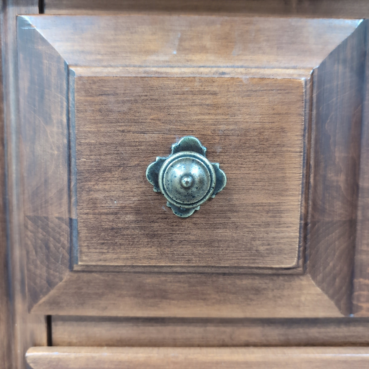 Traditional Brown Wood Dresser with Ornate Hardware