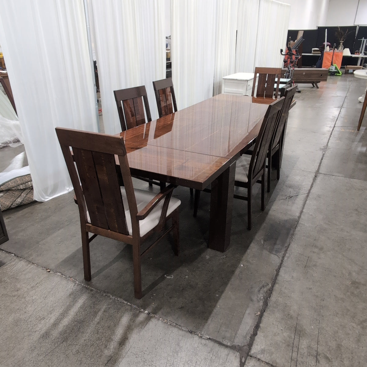 Chestnut brown dining table with 6 matching chairs