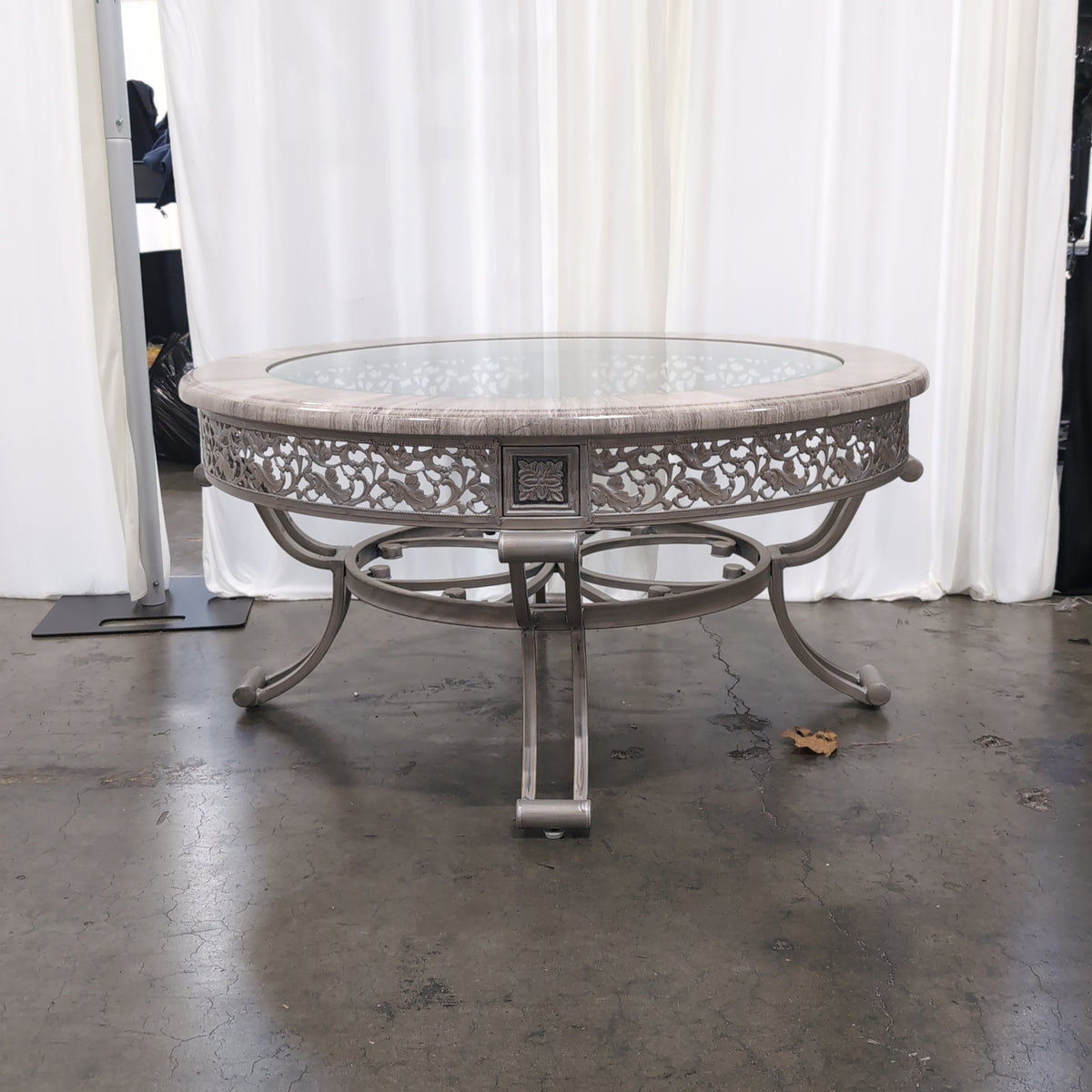 Silver-Toned Ornate Round Coffee Table with Glass Top