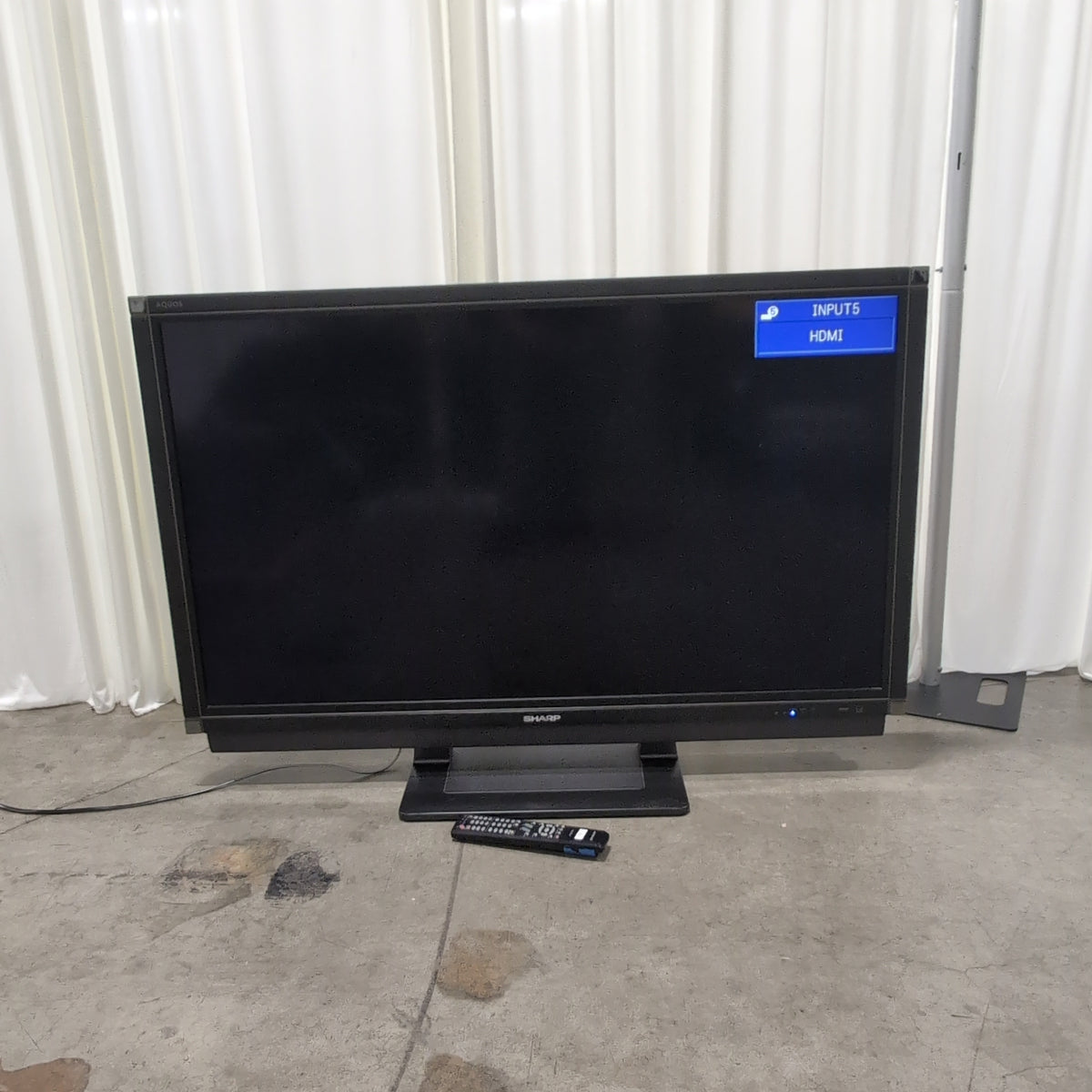 Sharp Aquos Black Flat Screen Television with Remote