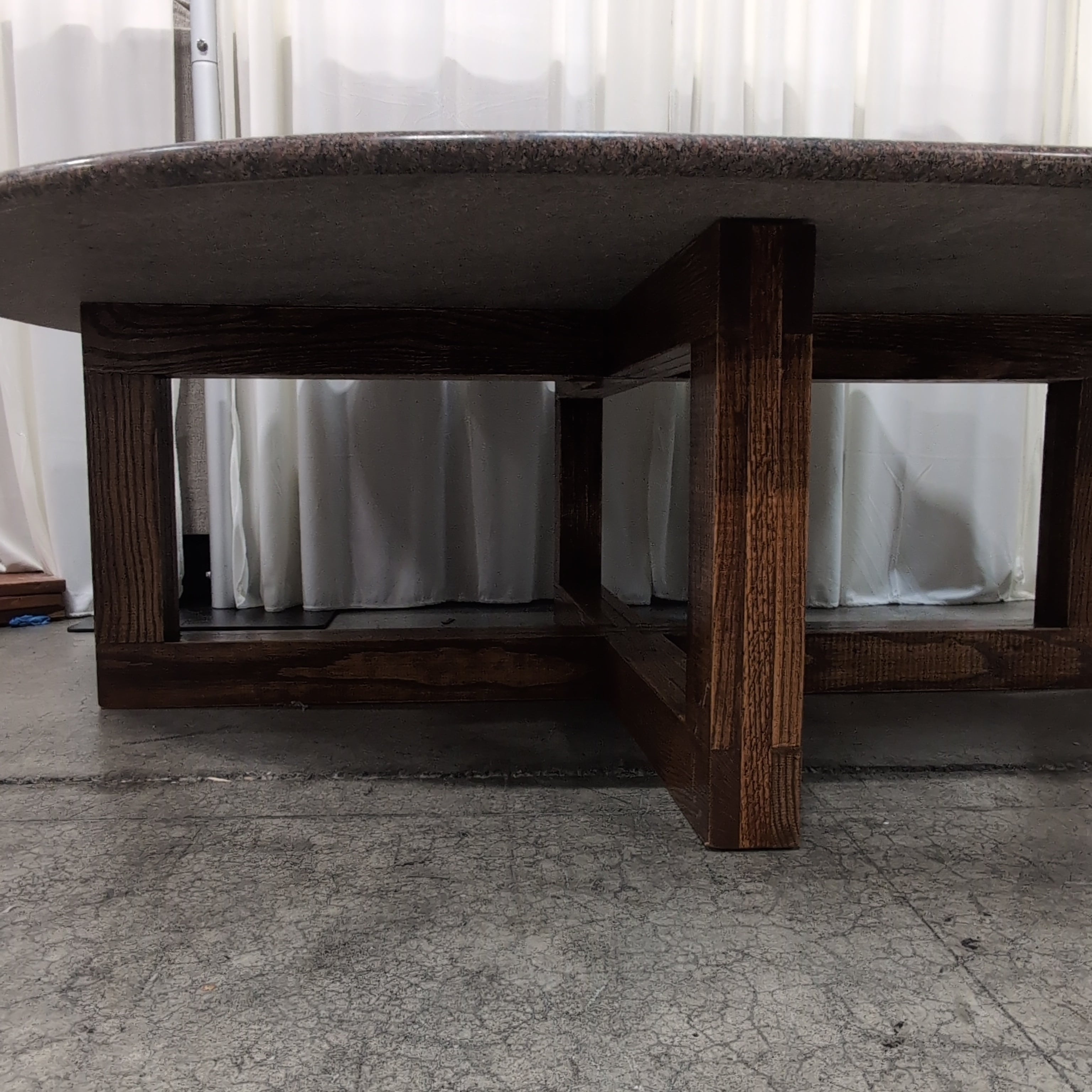 Round Light Granite Dining Table with Scrolled Iron Base