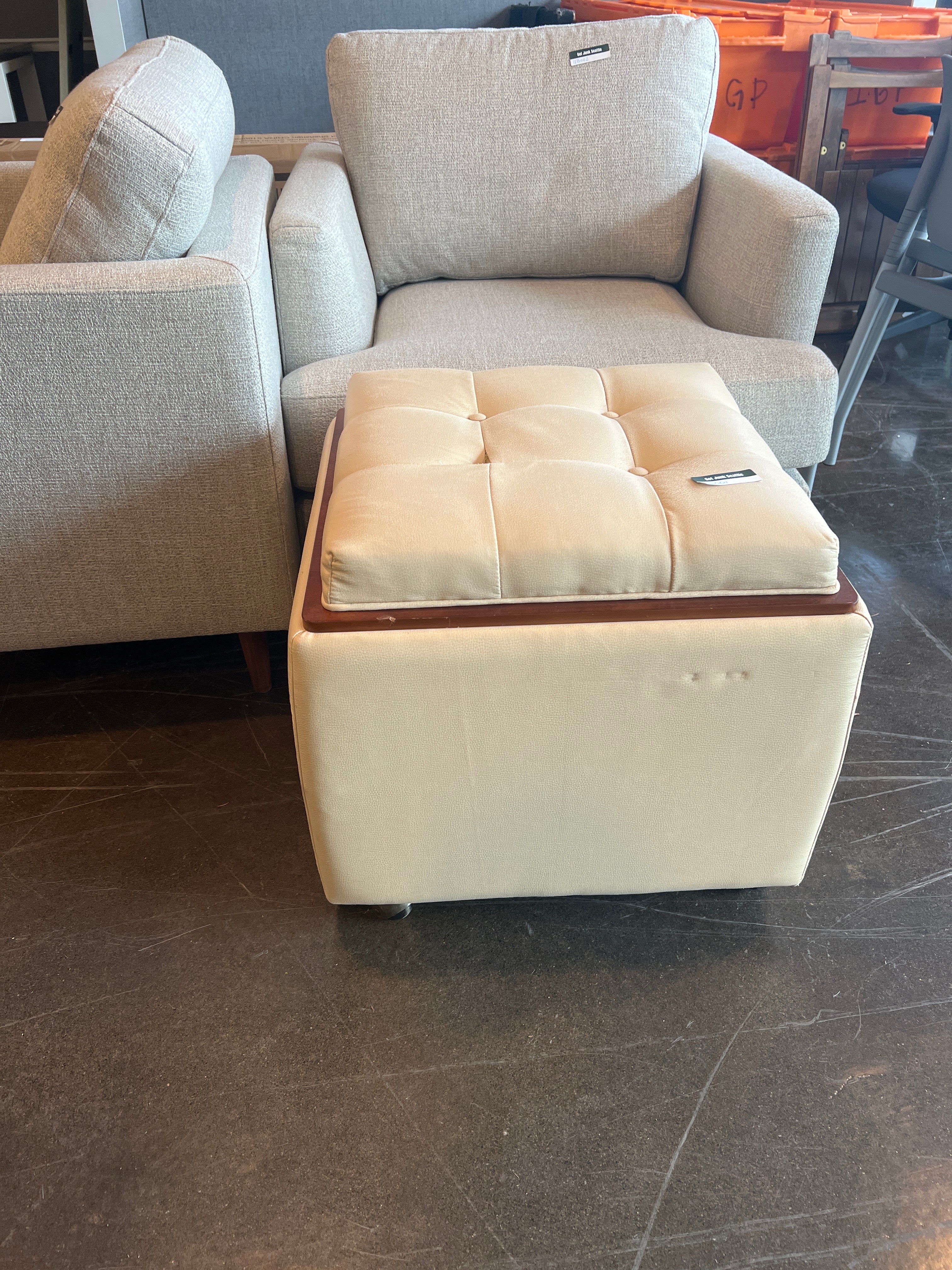 Lazy-e-Boy Leather tuffed ottoman, small rip