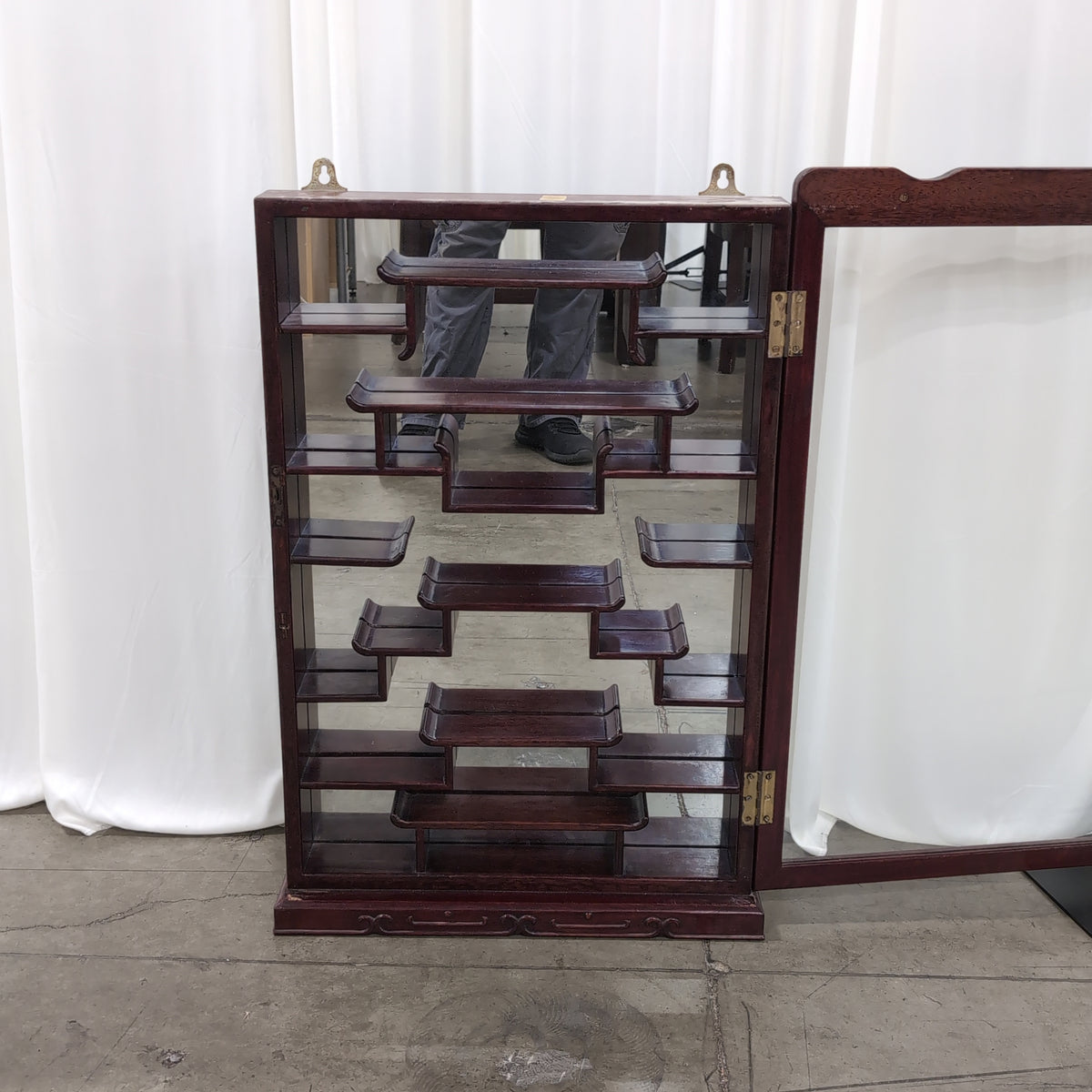 Reddish Brown Wood Display Case with Intricate Shelving