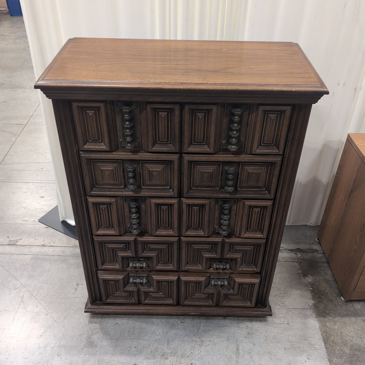 Dark Wood Carved Geometric Dresser with Ornate Hardware