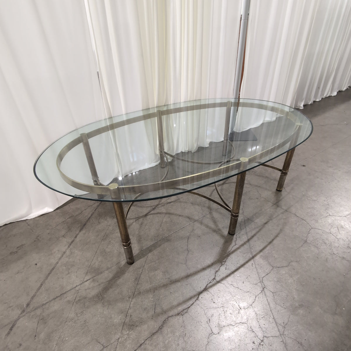 Oval Glass Top Coffee Table in Brass-Tone Metal