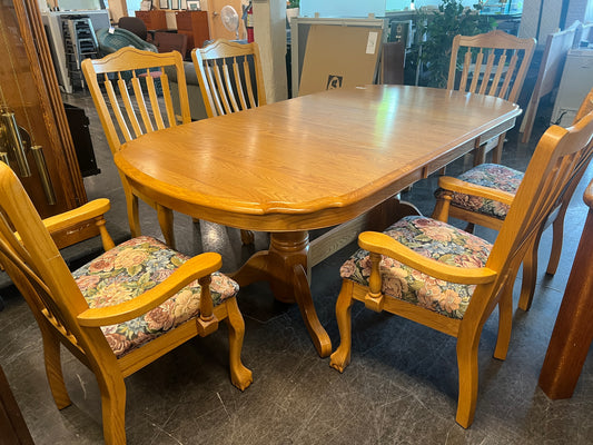 Oval Oak Dinning Table with Six Chairs with Floral Accent