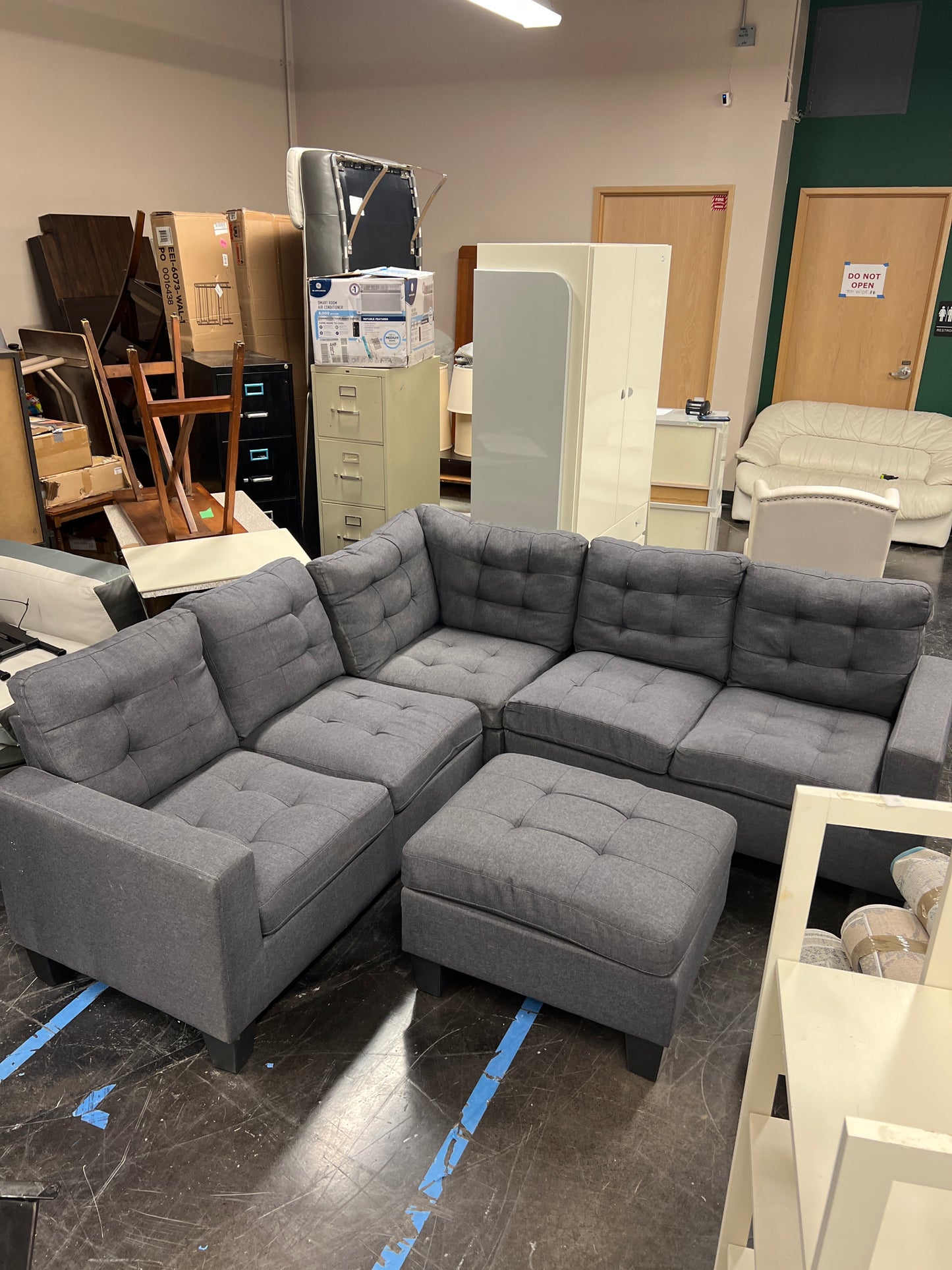 Dark Gray Upholstered Sectional with Ottoman