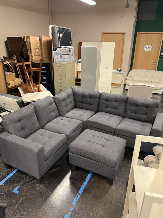 Dark Gray Upholstered Sectional with Ottoman