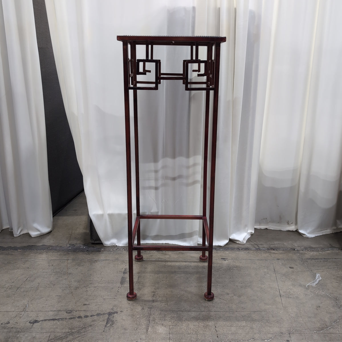 Burgundy Metal Display Stand with Patterned Top