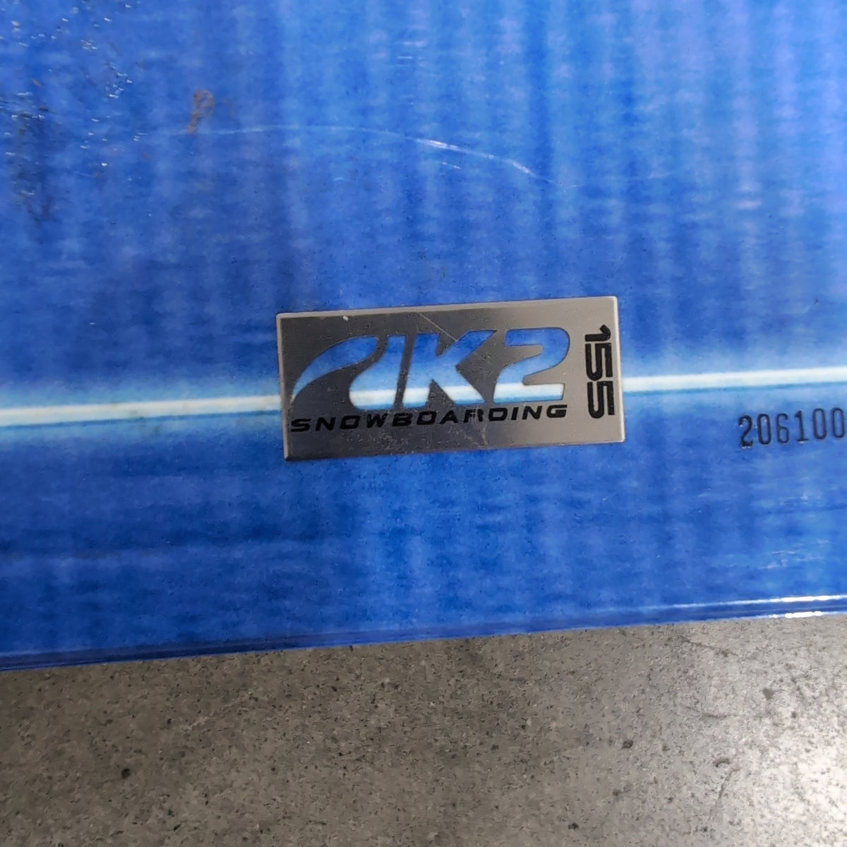 K2 Blue Snowboard with SPITFIRE Graphic