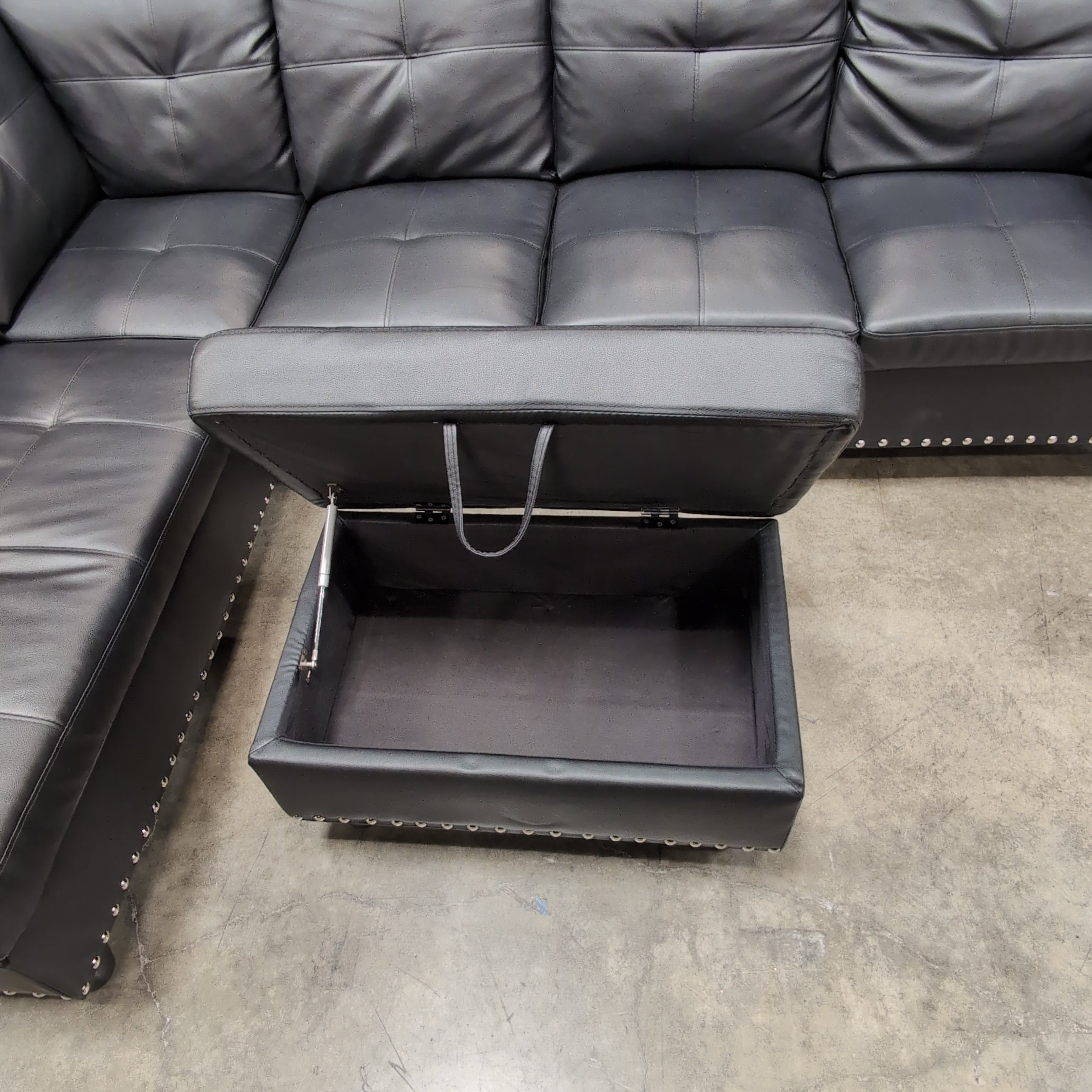 Black Faux Leather Sectional Couch with Ottoman