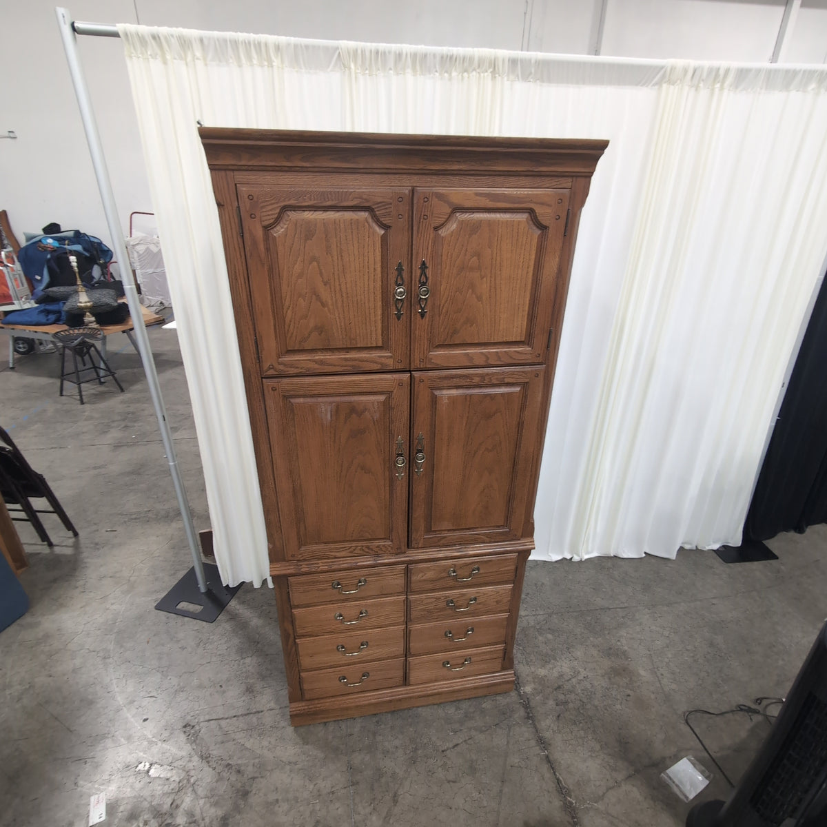 Medium Brown Wood Armoire with Ornate Hardware