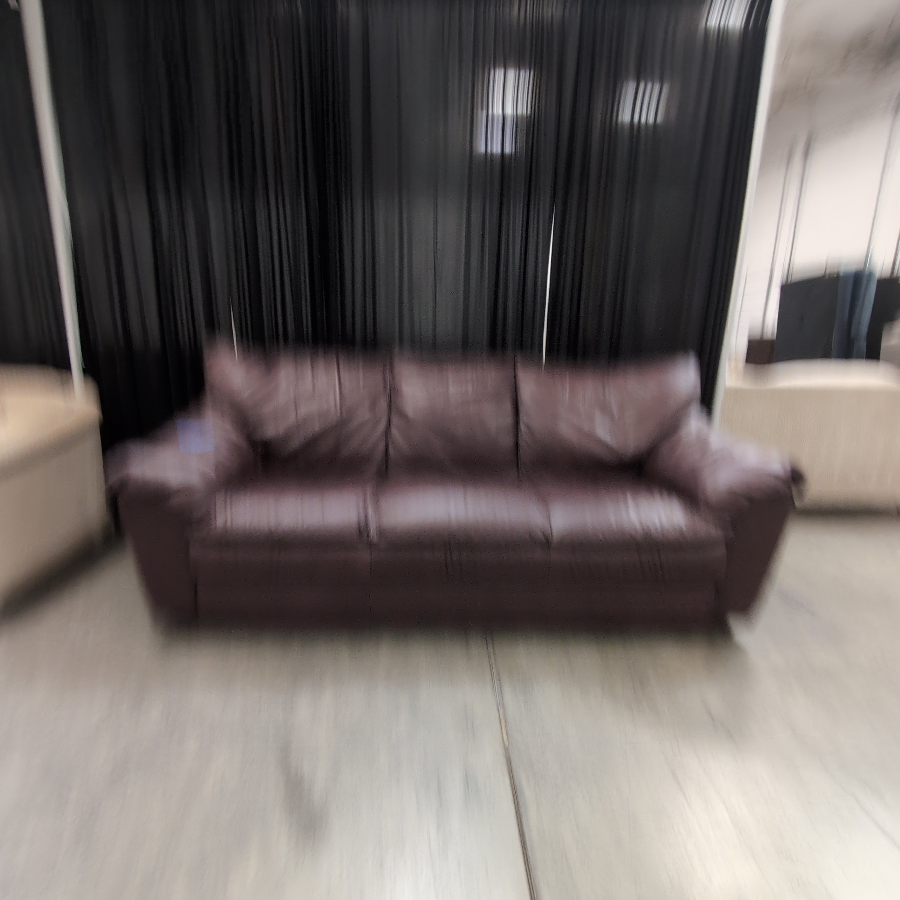 Dark Reddish Brown Three-Cushion Couch