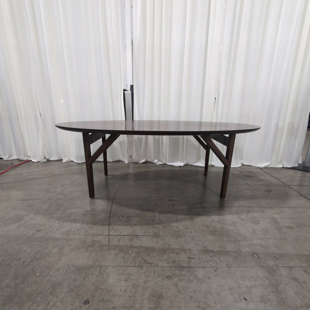 Oval Dark Wood Dining Table with Angled Legs