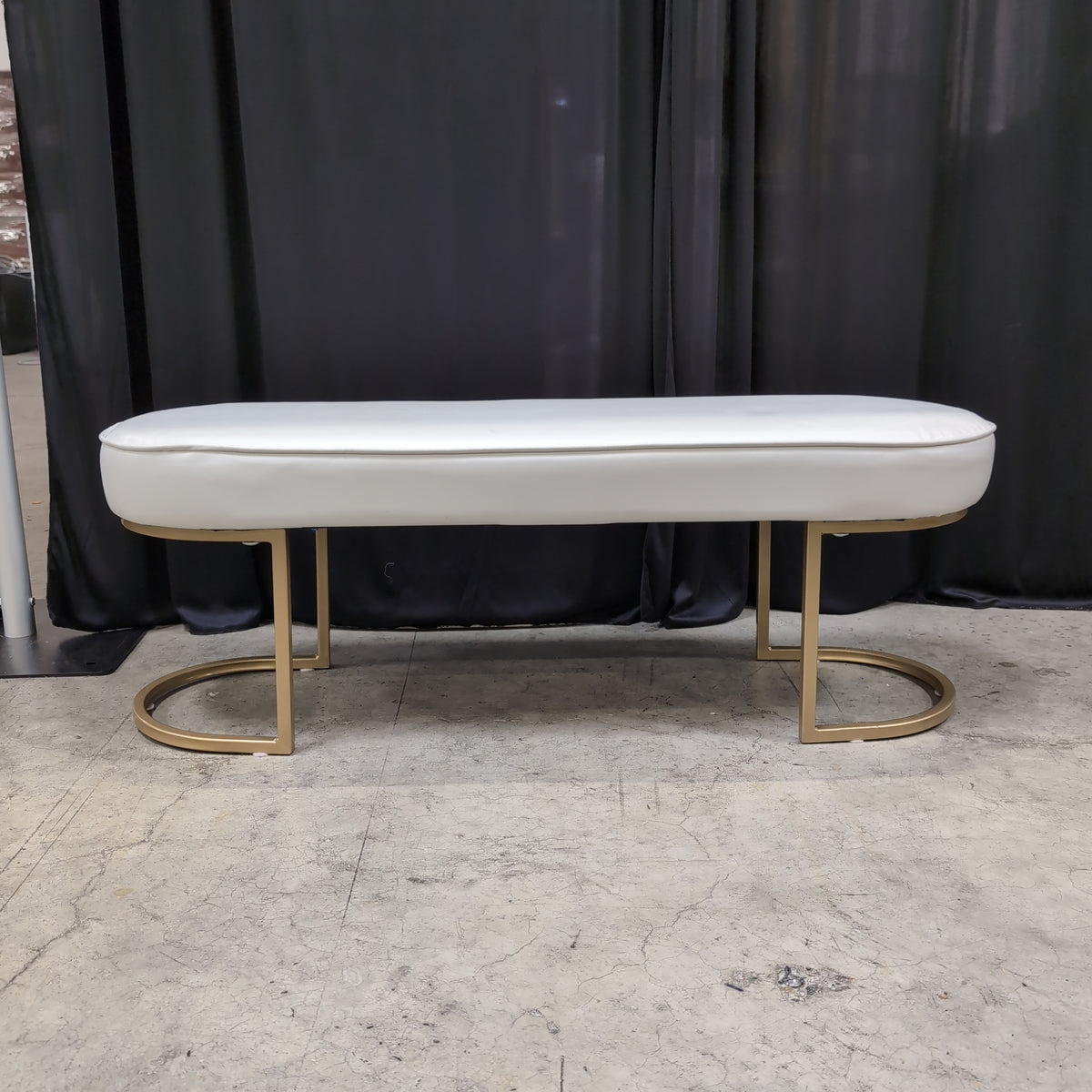 White Upholstered Oval Bench with Gold Base