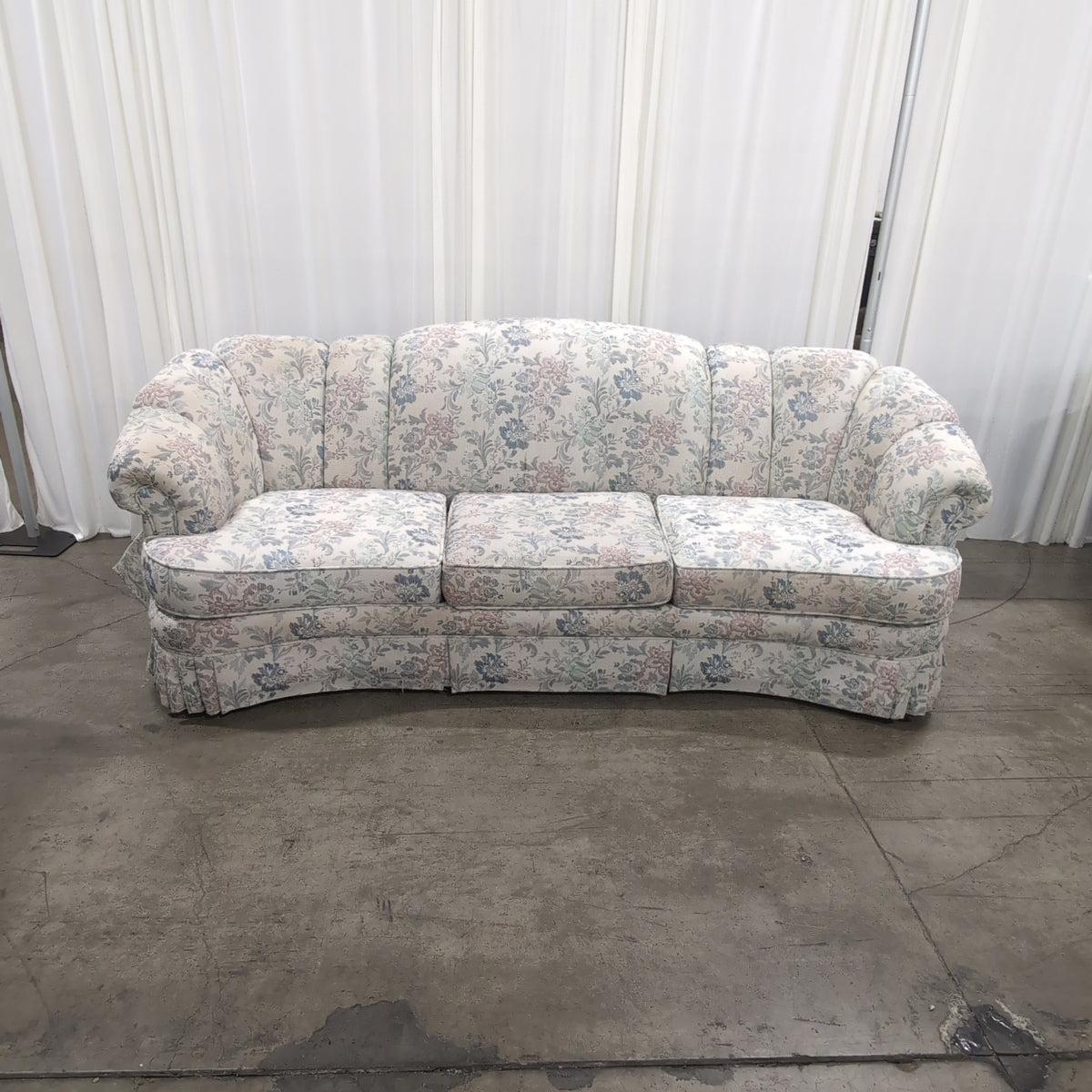 Floral Pattern Skirted Upholstered Couch with Rolled Arms