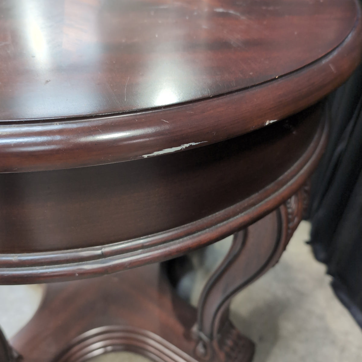 Dark Wood Round End Table with Starburst Inlay