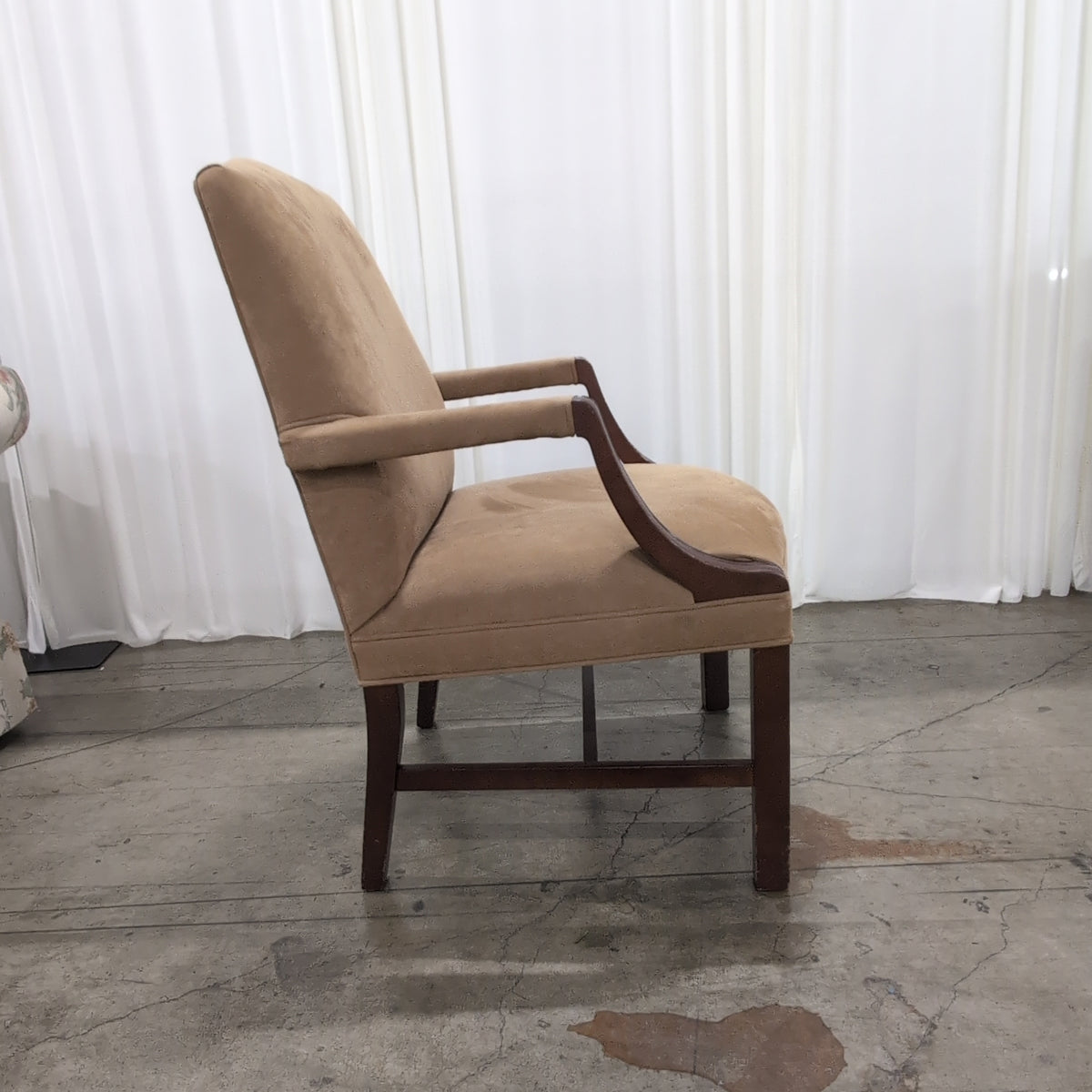 Tan Upholstered Arm Chair with Dark Wood Trim