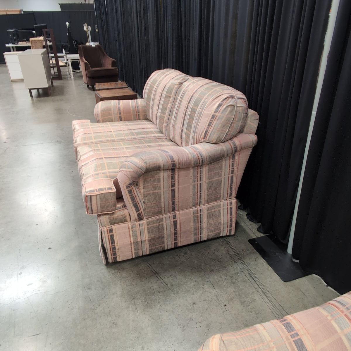 Multi-Color Plaid Rolled Arm Loveseat with Skirted Base