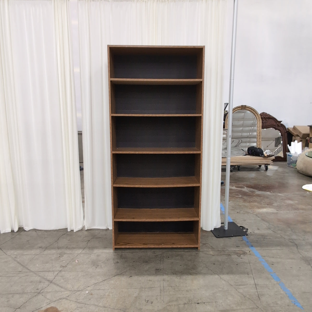 Brown Wood-Look Six-Shelf Bookcase with Dark Back Panels