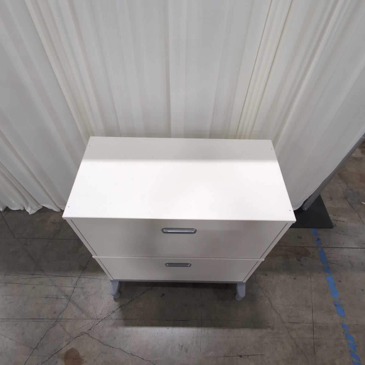 Light Gray Three-Drawer Dresser with Silver Pulls