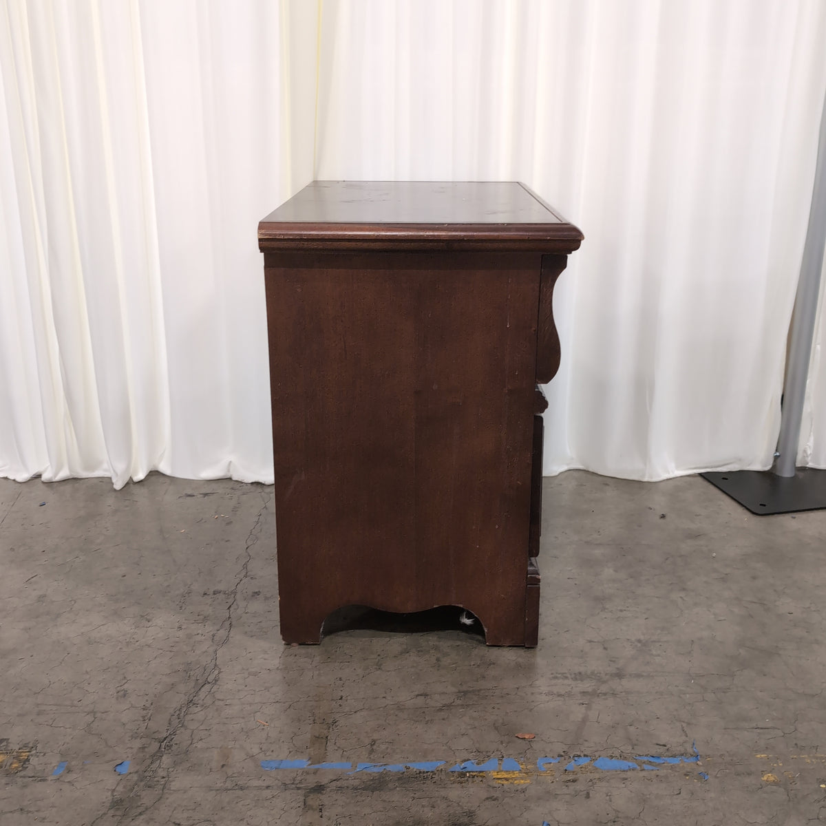 Traditional Dark Wood Two-Drawer Nightstand with Ornate Hardware