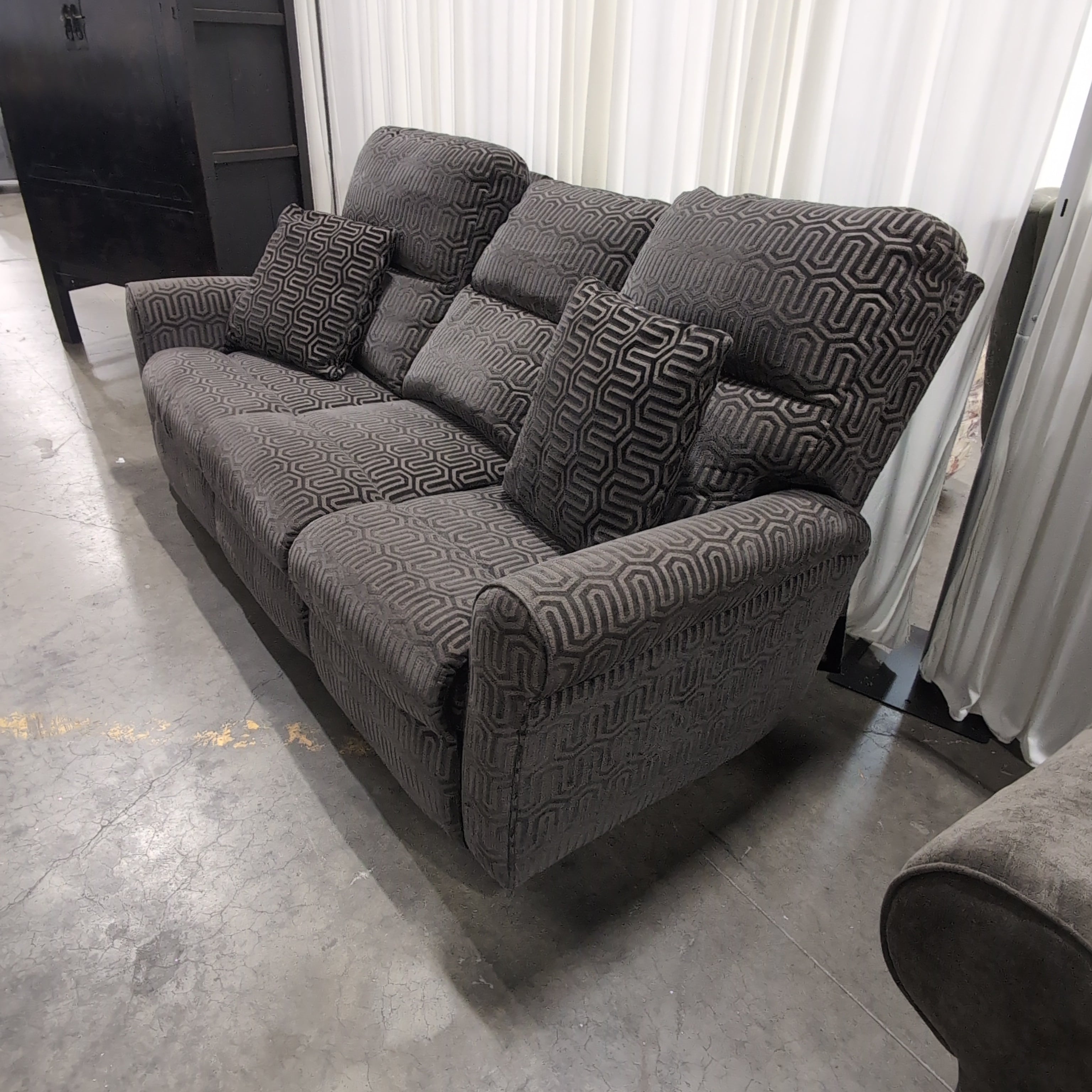 Charcoal Fabric Reclining Couch with Geometric Pattern