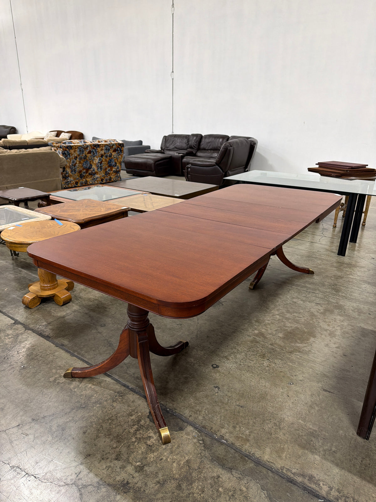 Reddish Brown Hardwood Dining Table with Rounded Corners