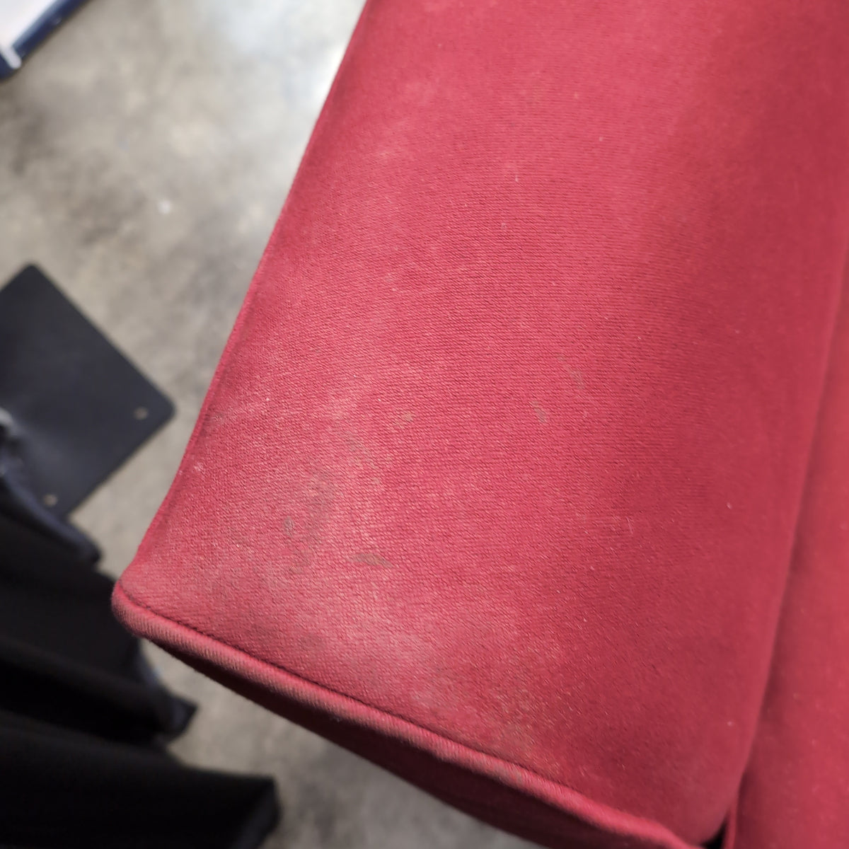 Red Upholstered Two-Cushion Fabric Loveseat with Dark Wood Base