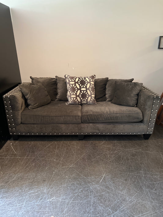 Dark Brown Tufted Sofa with Metal Accents